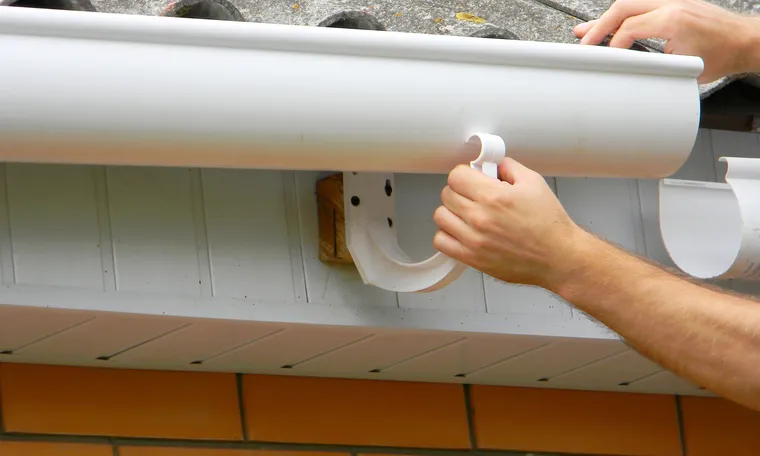 Leaf-protection gutter guards installed over a gutter