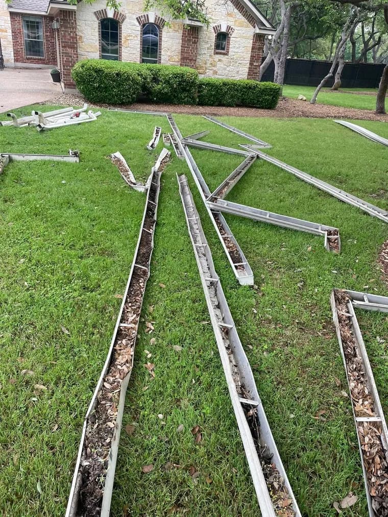 Clean, well-maintained gutter system on a completed Texas home